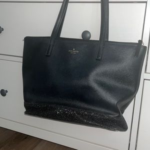 Kate spade black purse , used a handful of times still I’m great condition